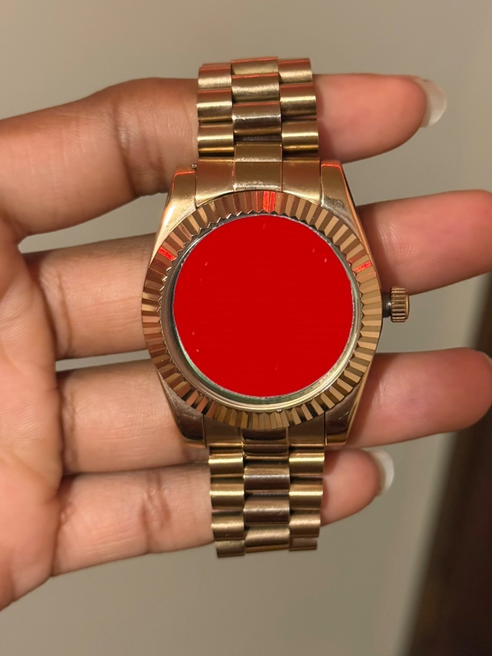 Rose Gold Watch with a Green Face